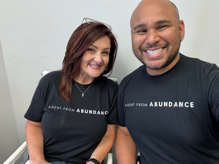 Two people smiling